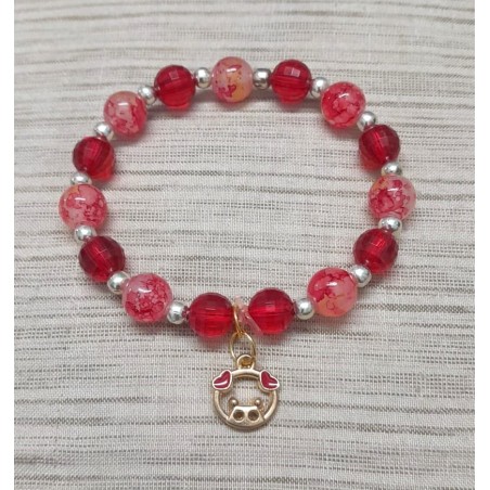 Red bracelet with charm